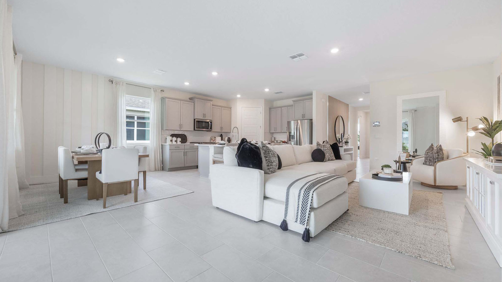 Living room and dining room overlooking kitchen
