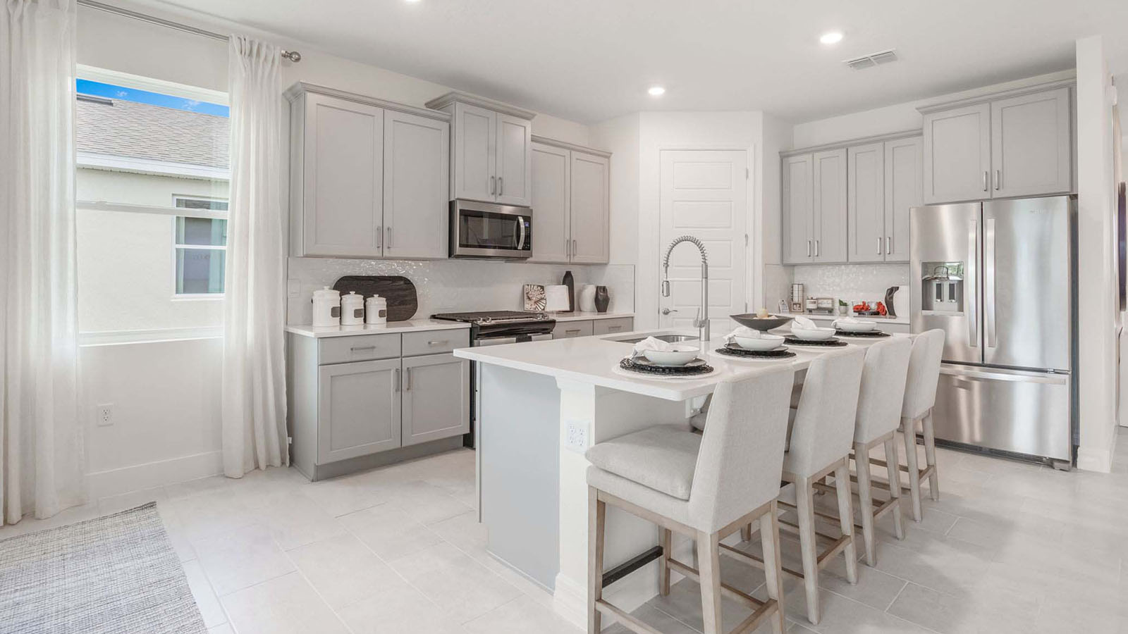 Kitchen with large island and seating