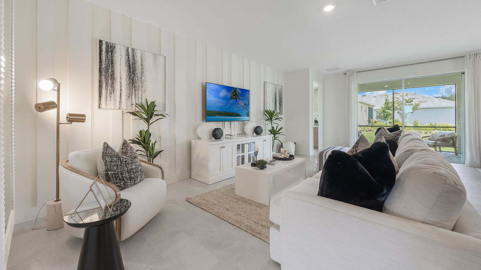 Living room with sliding glass door to back porch