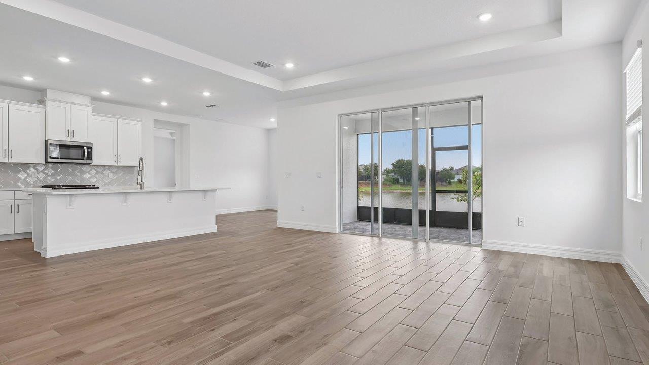 Great room with access to screaned in patio
