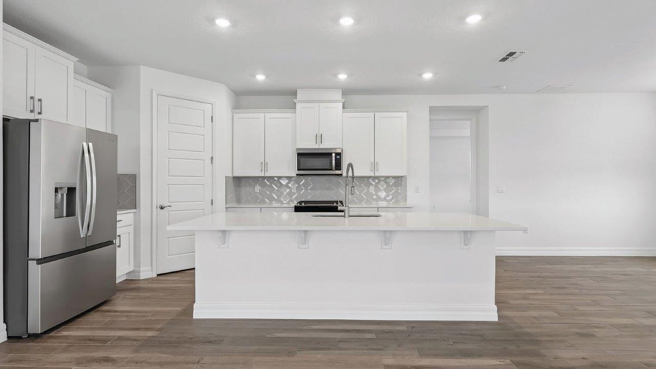 Kitchen with large island and pantry