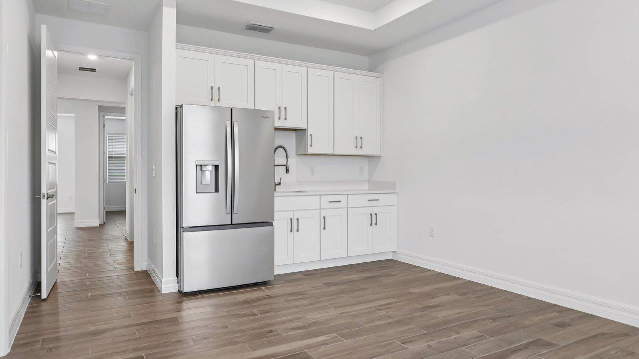 multi-gen suite living room with kitchenette area