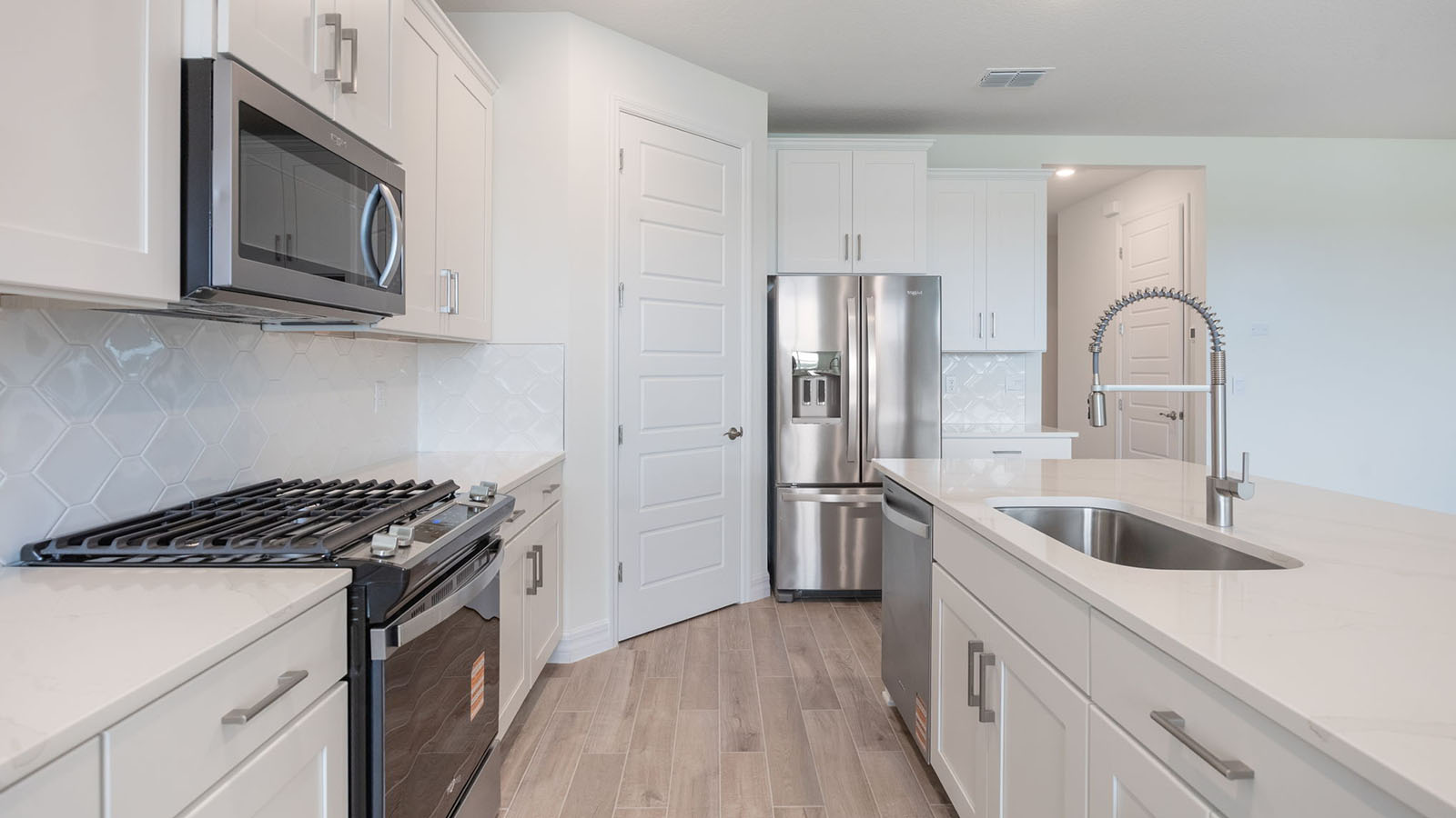 Kitchen with gas stove and stainless steel appliances