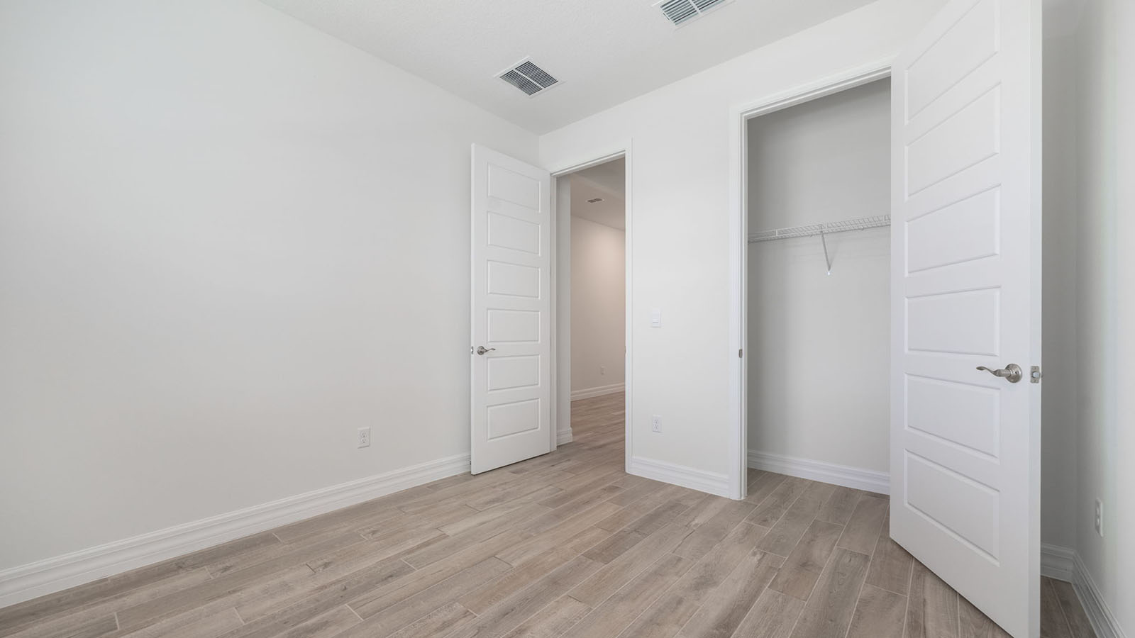 Bedroom with built in closet