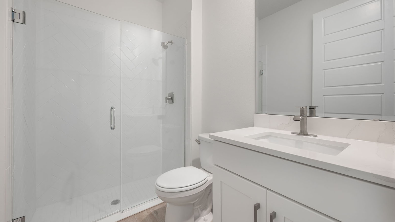 Guest bathroom with enclosed shower
