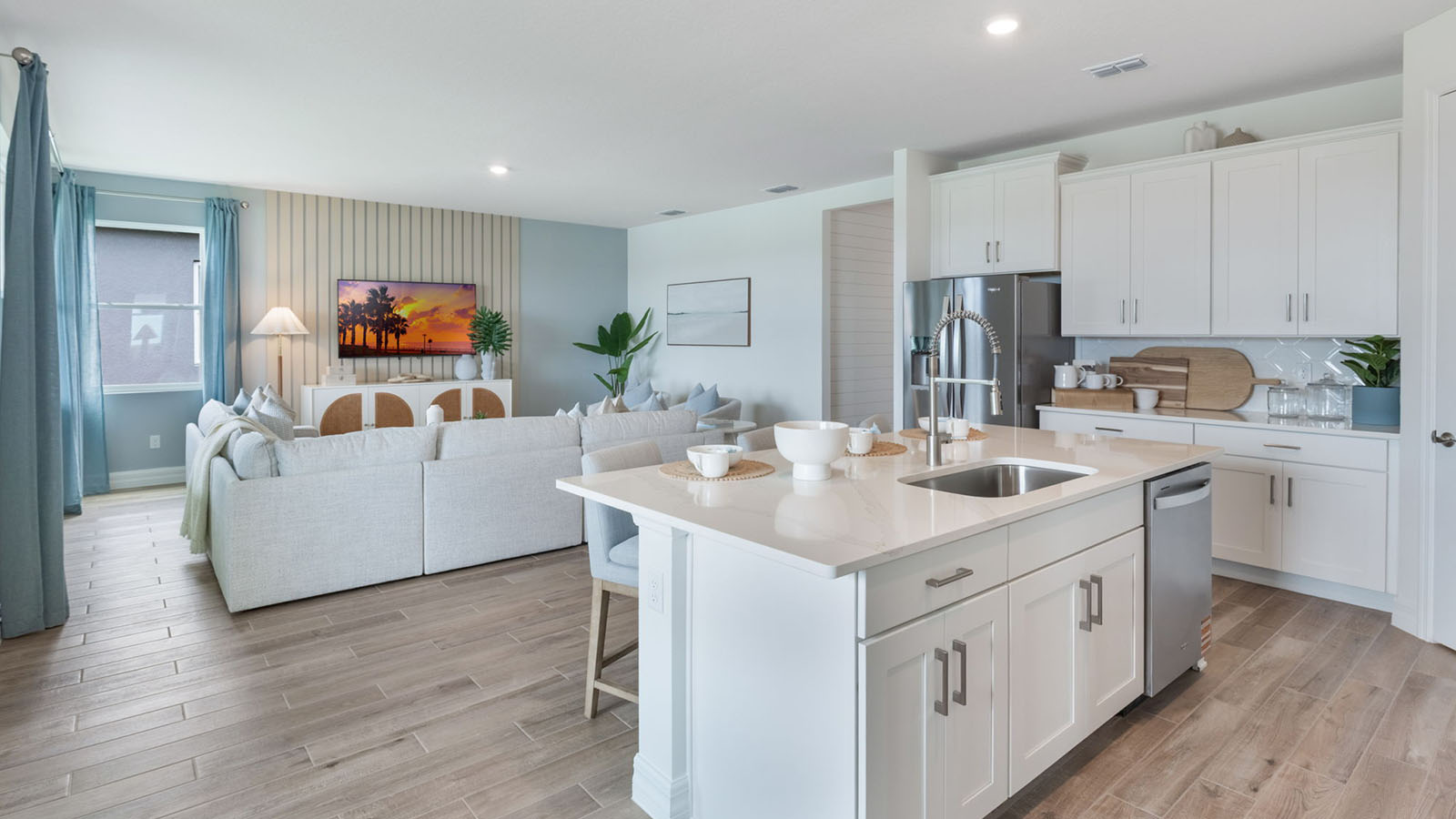 Kitchen with island and view to living room