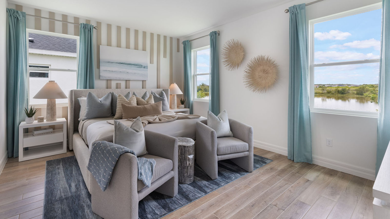 Primary bedroom with king size bed and seating