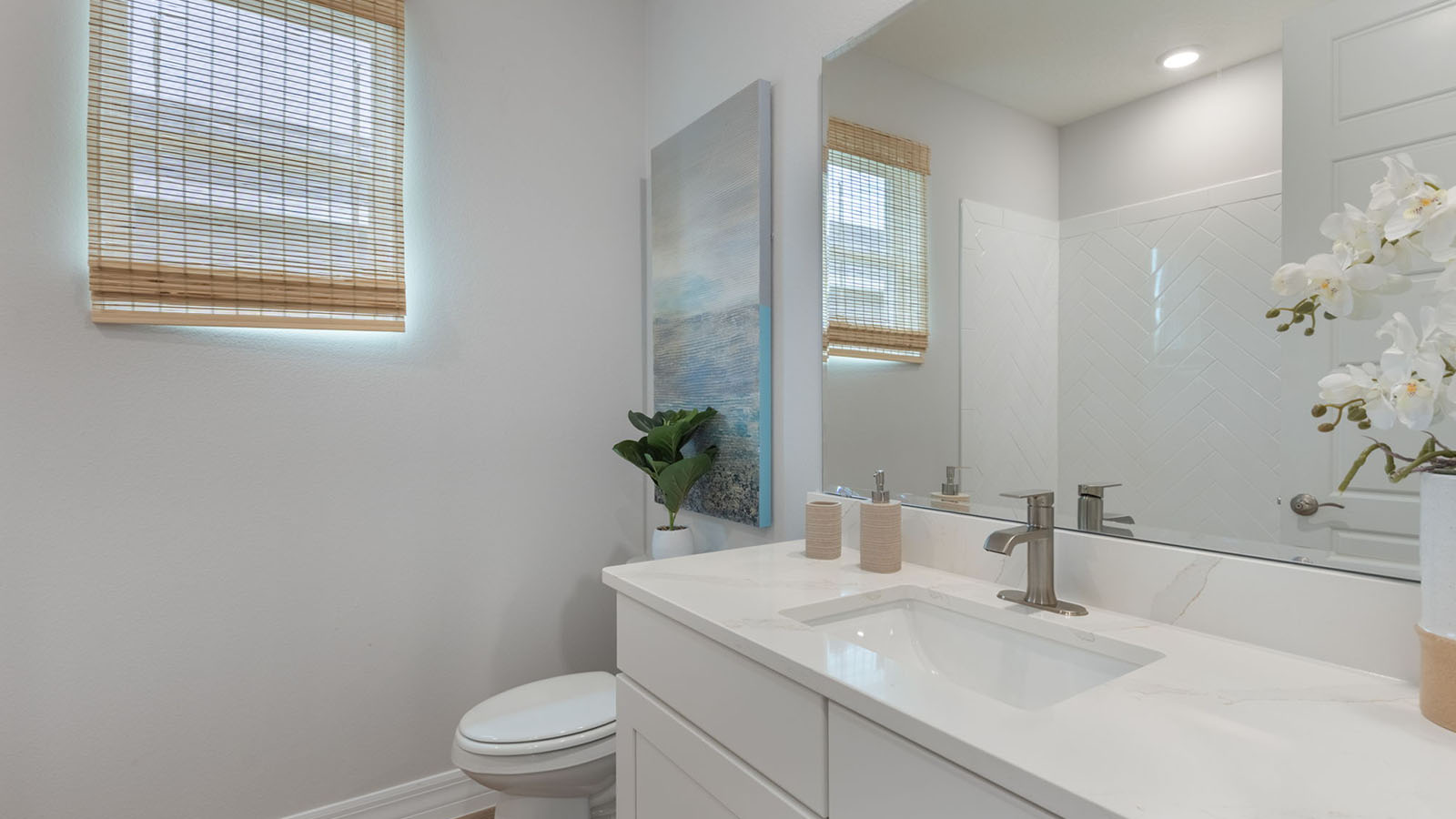 Bathroom with single vanity and enclosed shower