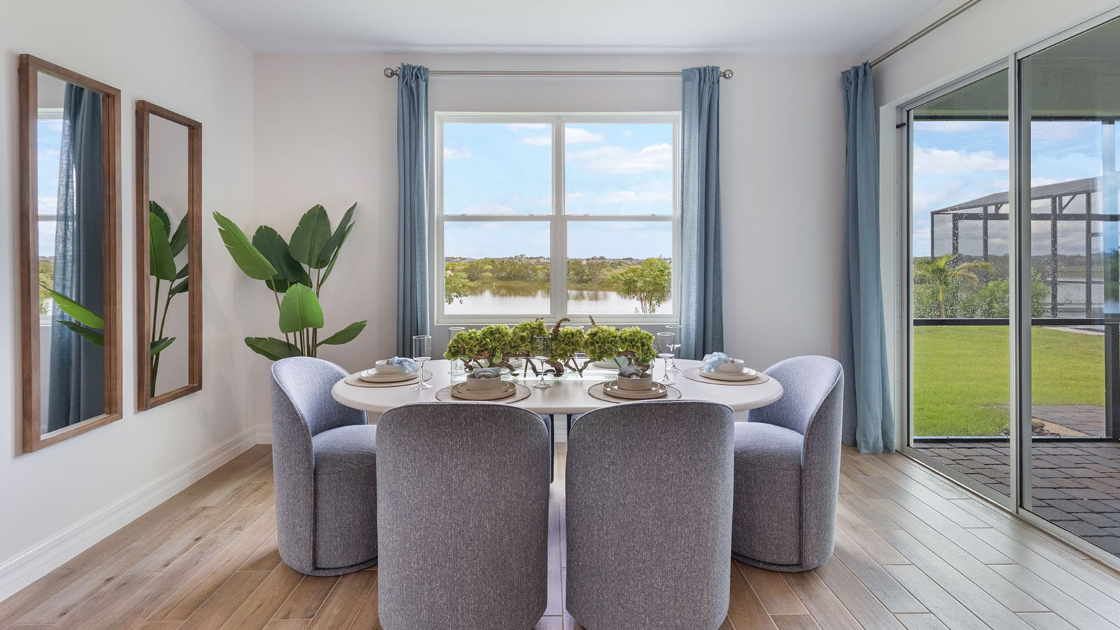 Dining room with sliding glass door to enclosed lanai