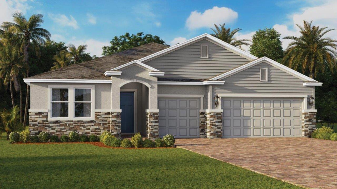 Exterior single family home with three car garage and paver driveway