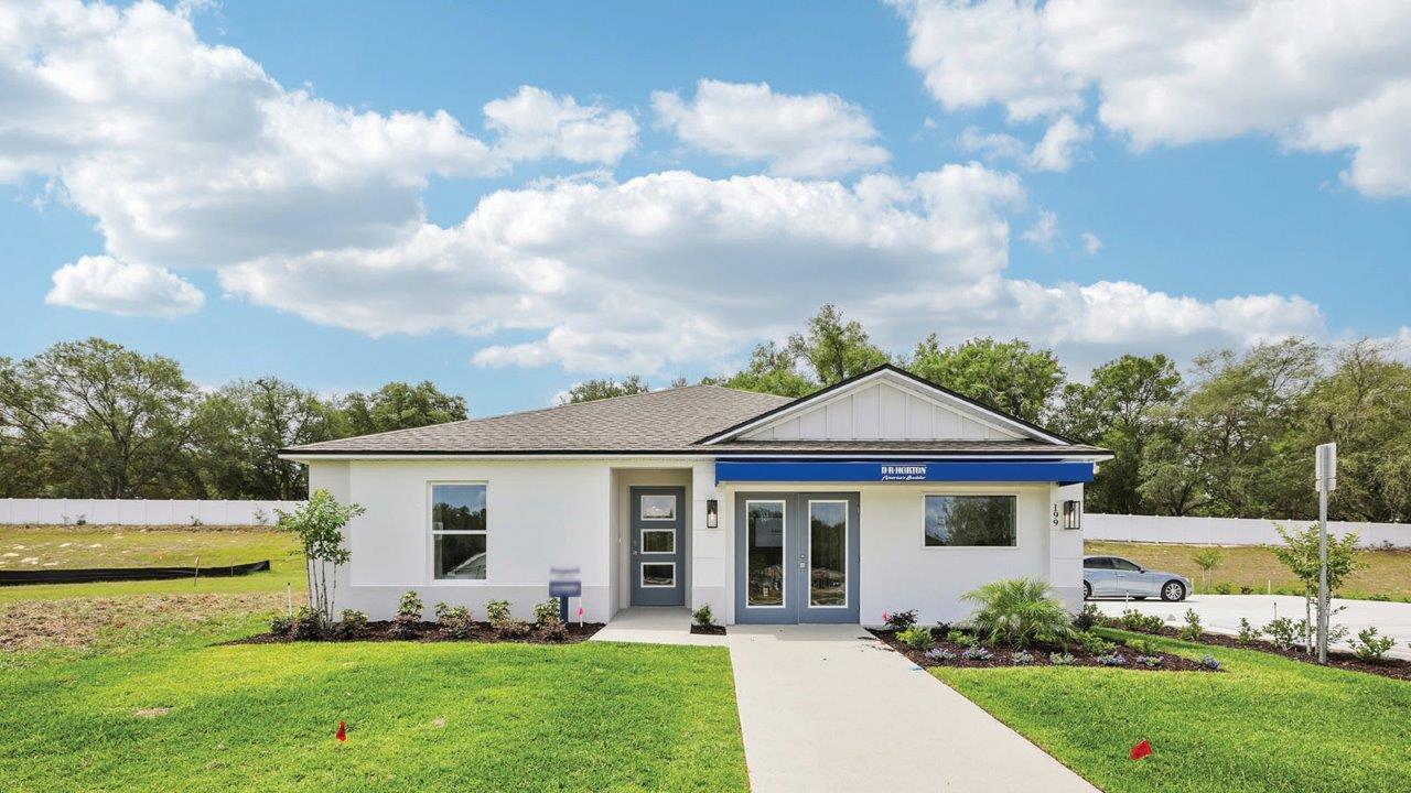 Exterior single family home sales office with modern elevation