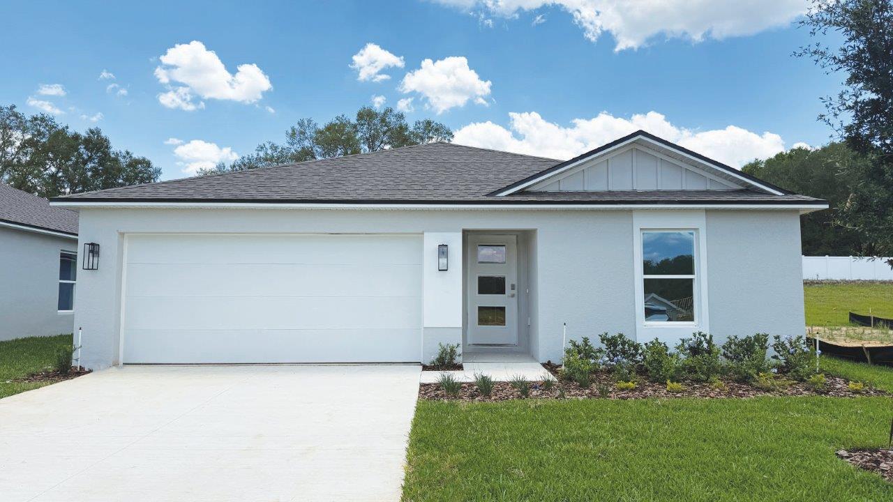 Exterior single family home with 2-car garage