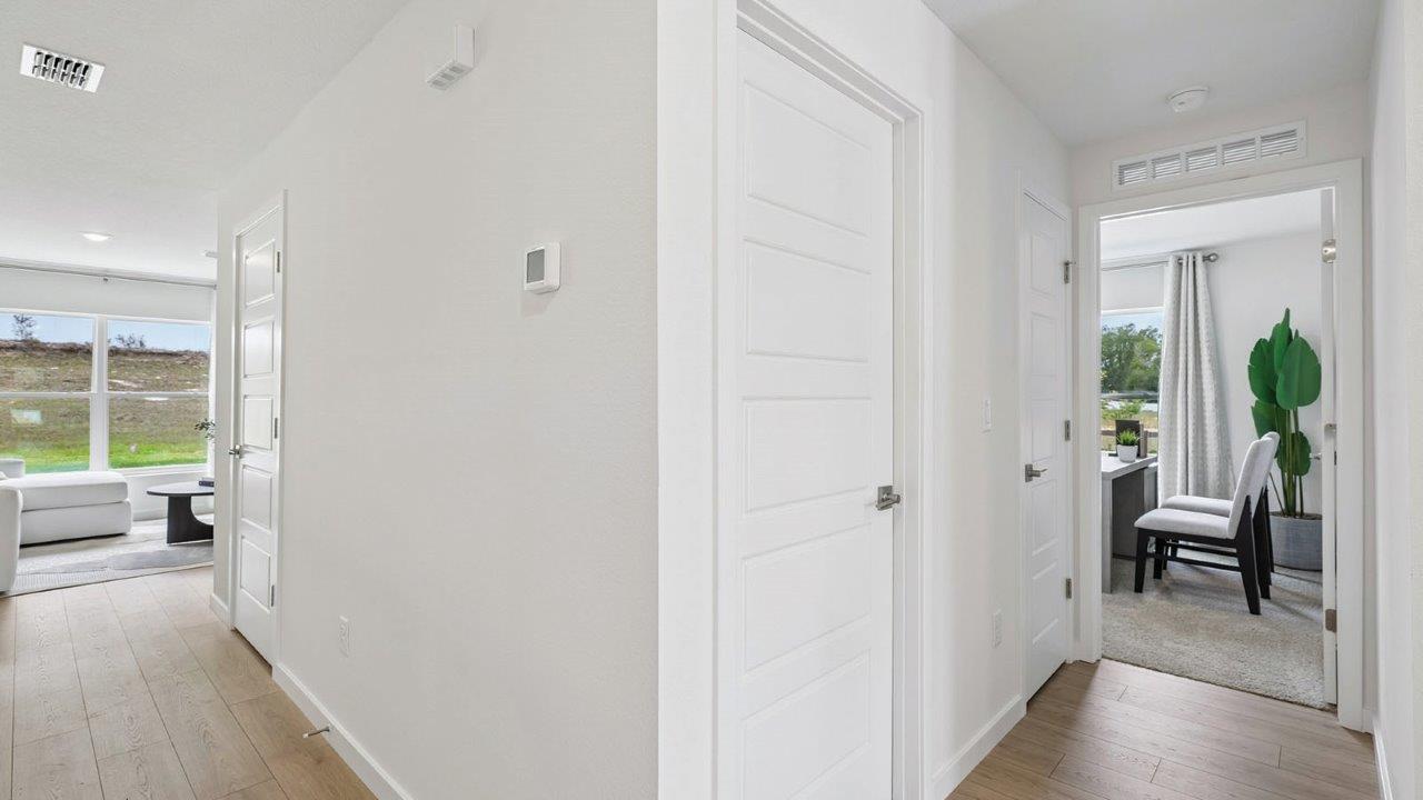 Hallway to additional bedroom