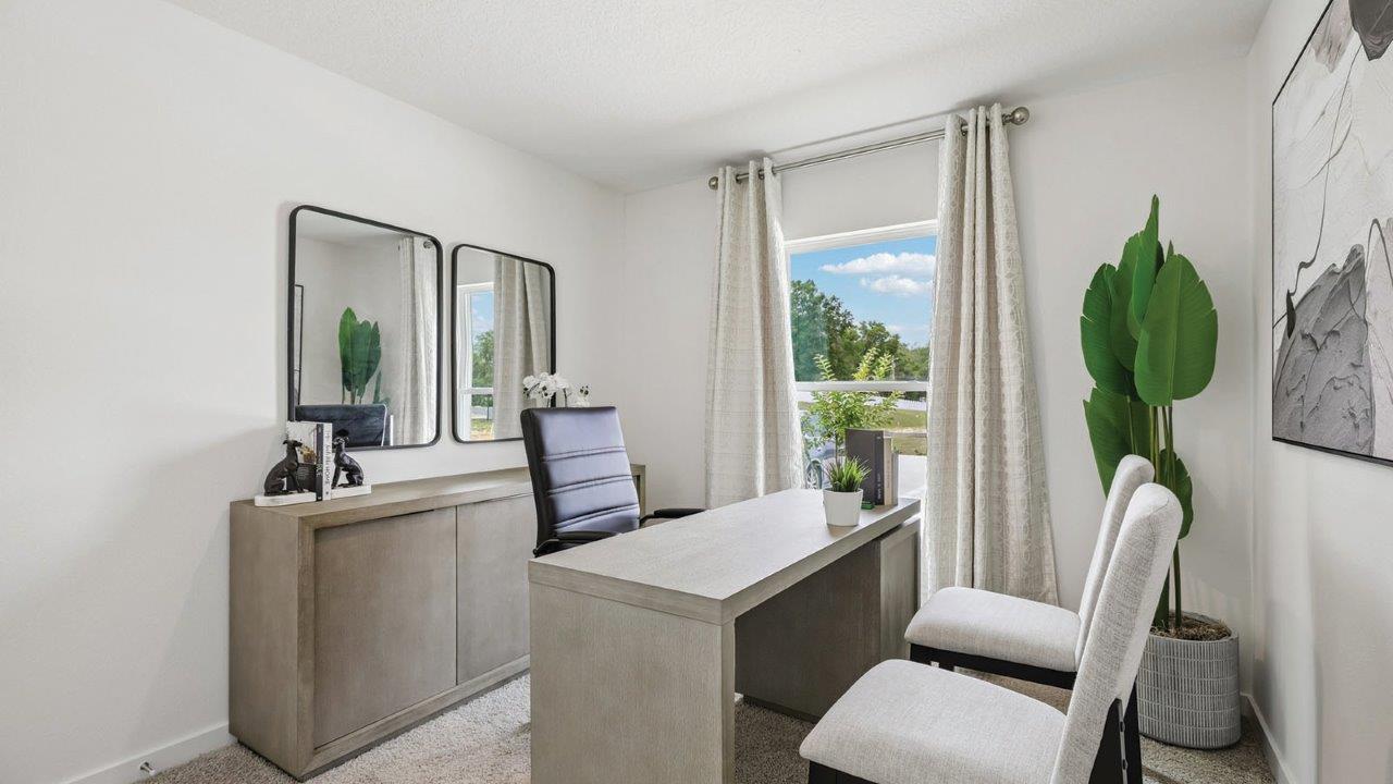 guest room staged as an office