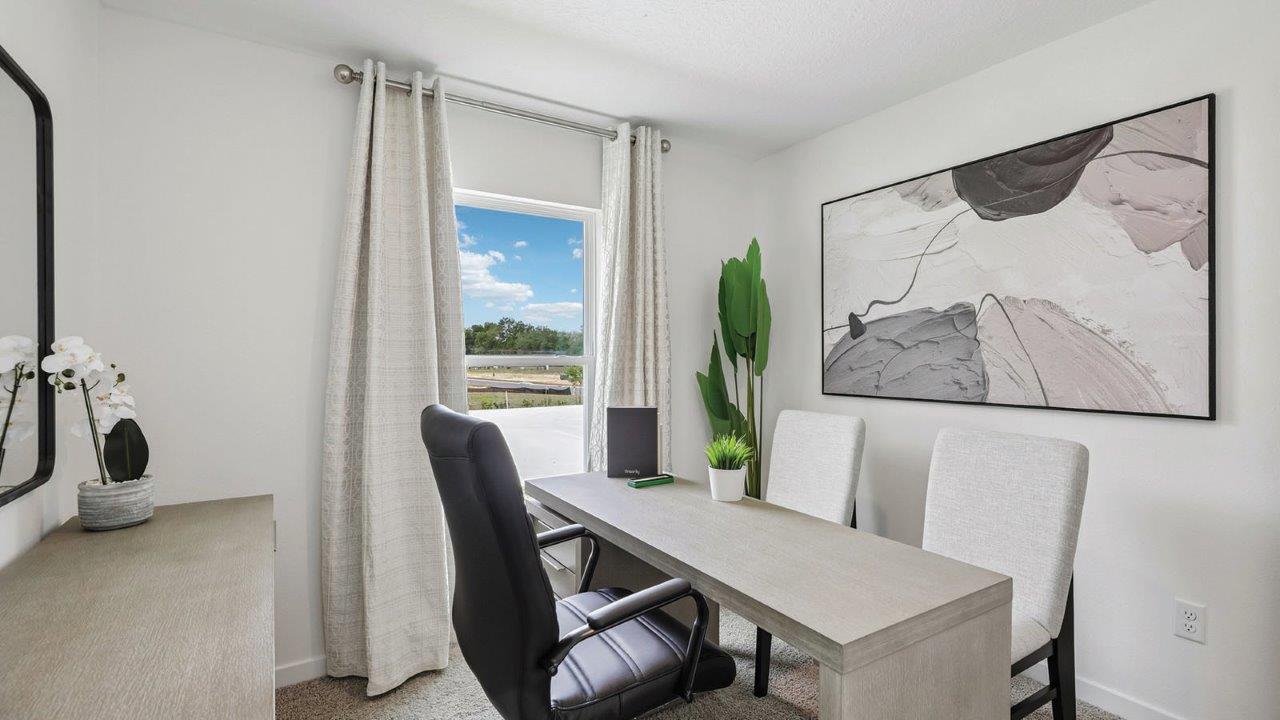 Guest room/office with desk and chairs