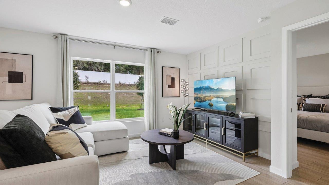 Living room with sectional and tv