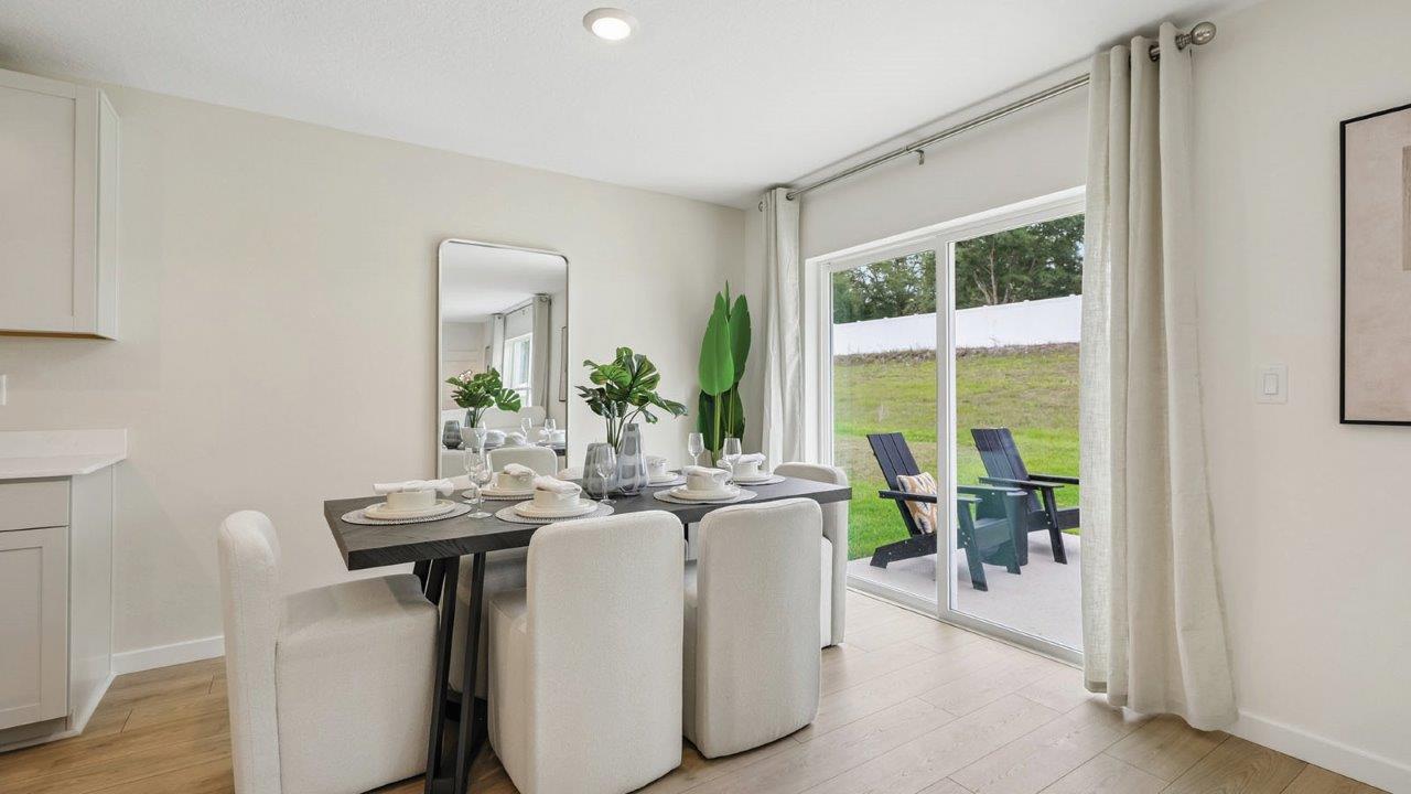 Dining room with table and sliding doors