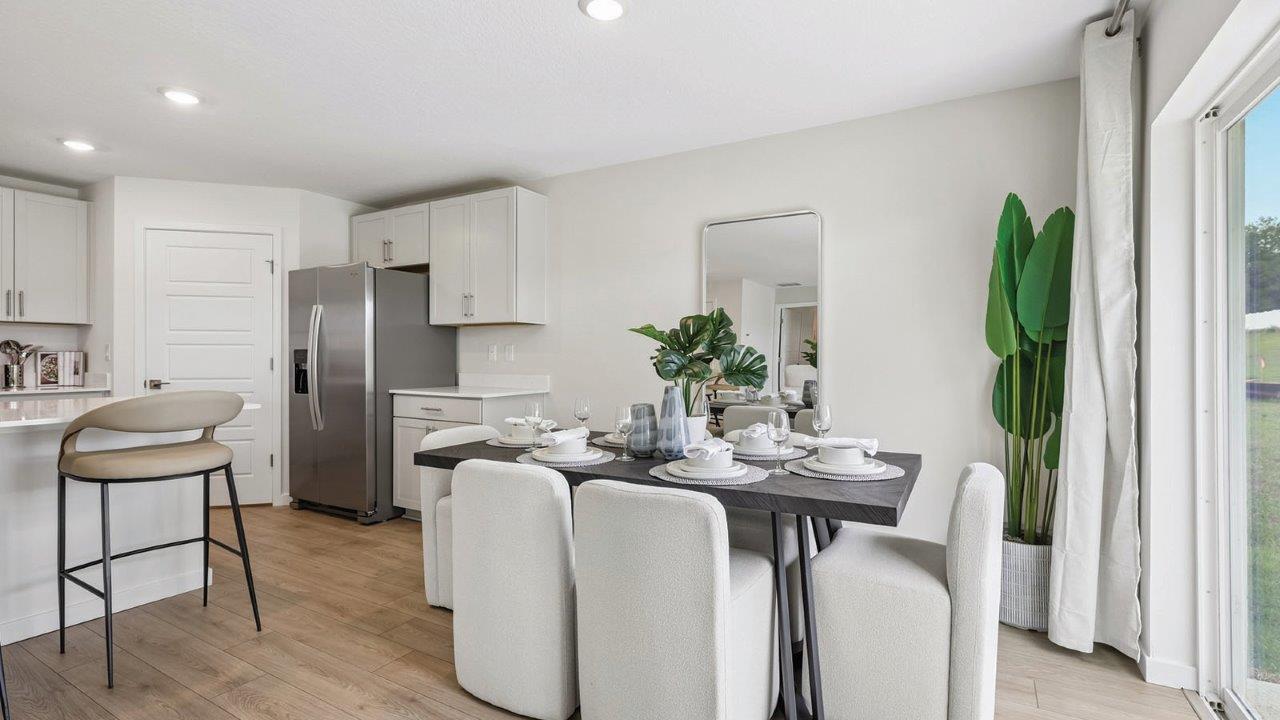 Dining room with view to kitchen