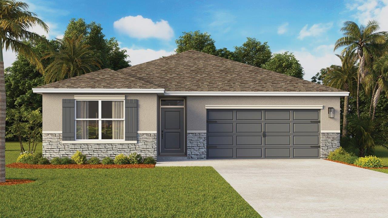 single story home with two car garage and stone accents