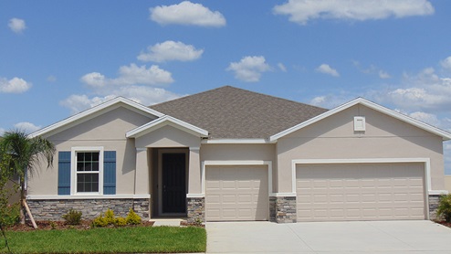 Single story new home with stucco, covered porch and 2 car garage. New construction land O Lakes.