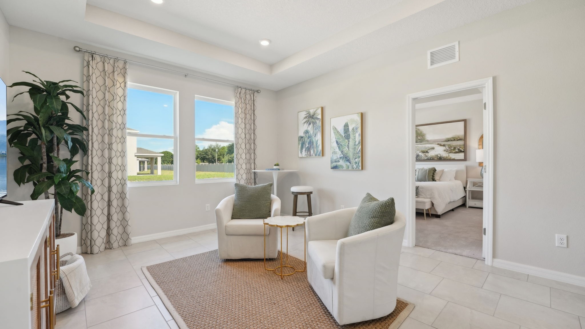 Guest bedroom with bed, nightstands, and a roomy closet for storage.