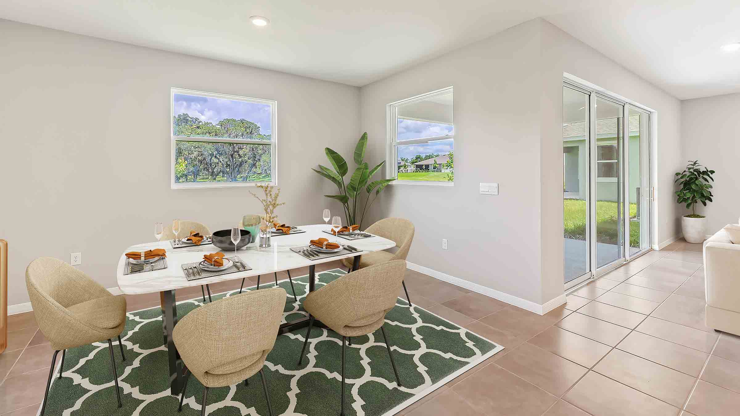 Dining room overlooking the living area, with table and chairs.