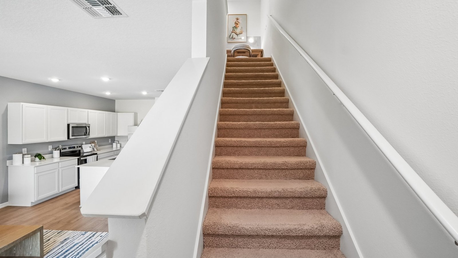 Stairway leading to second story of the home.