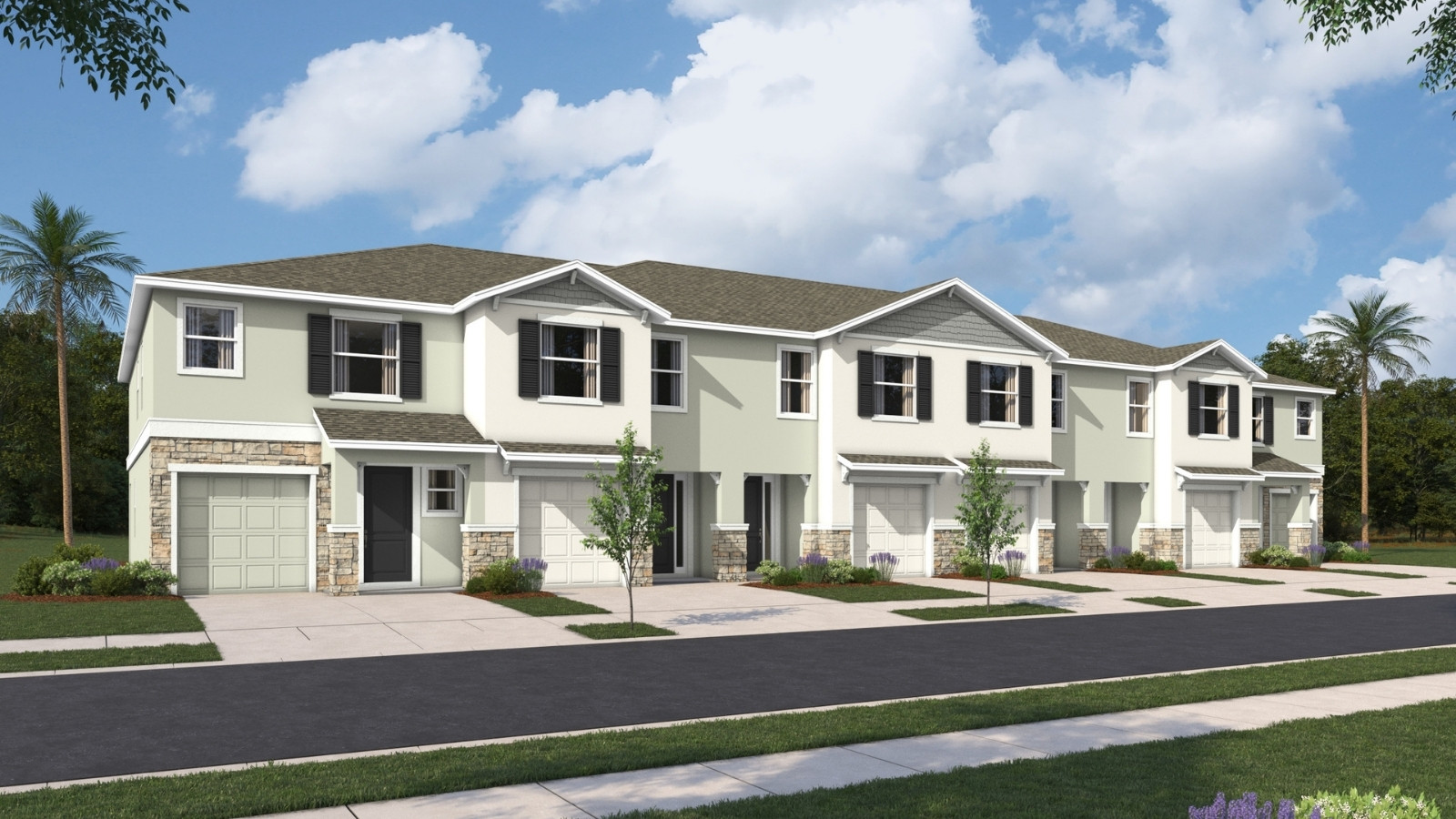 Two-story townhome with stucco exterior and windows