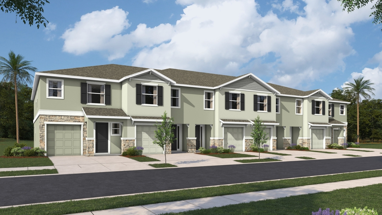 Two-story townhome with stucco exterior and windows
