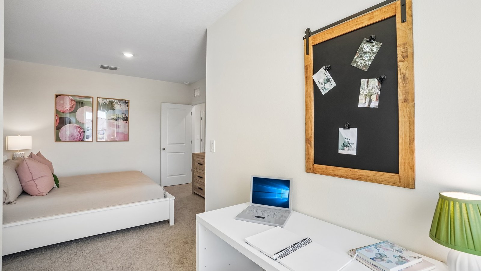 Guest bedroom with bed, nightstands and a roomy closet for storage.