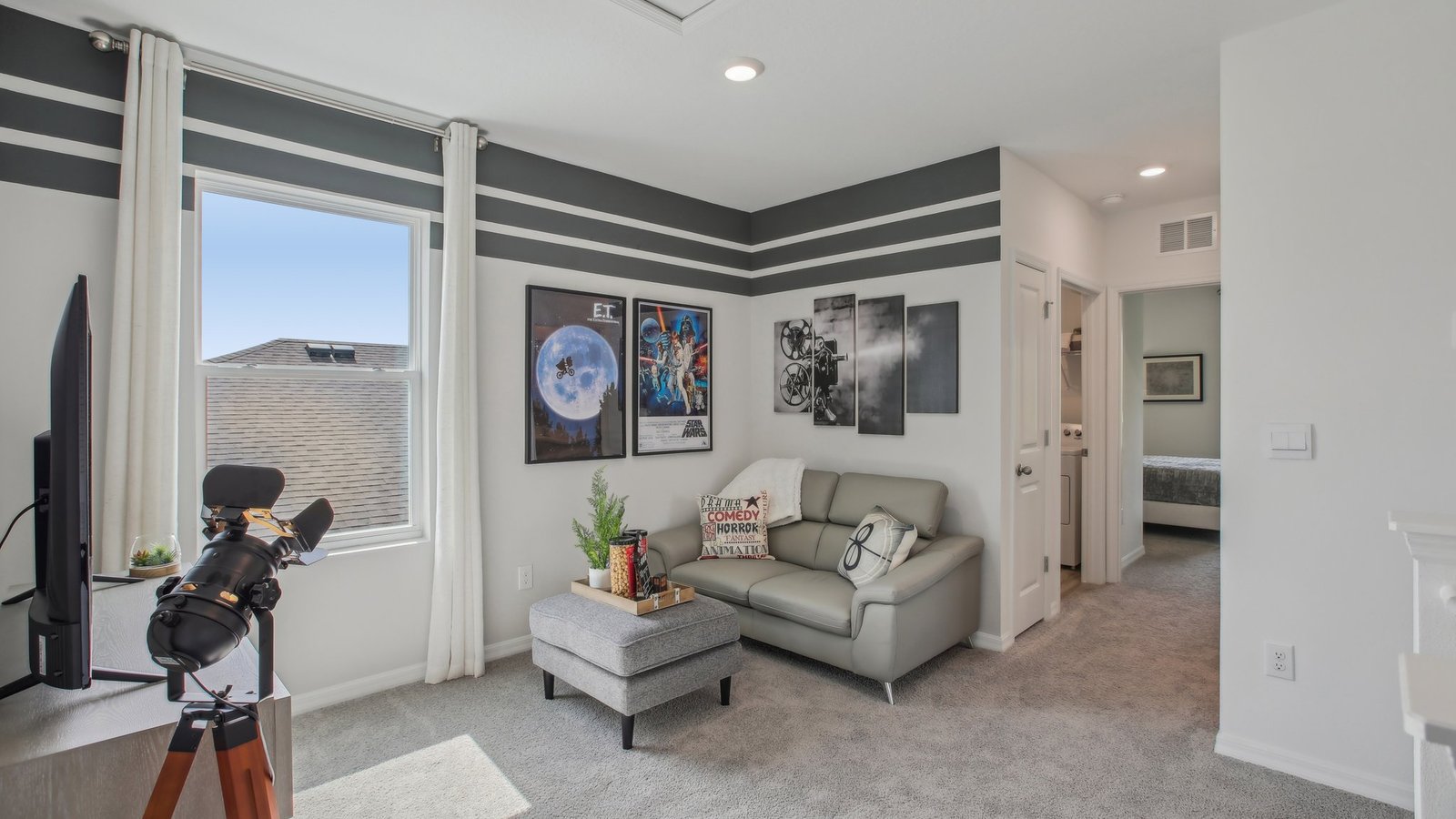 Spacious bonus room on second floor of home, with room of activities.