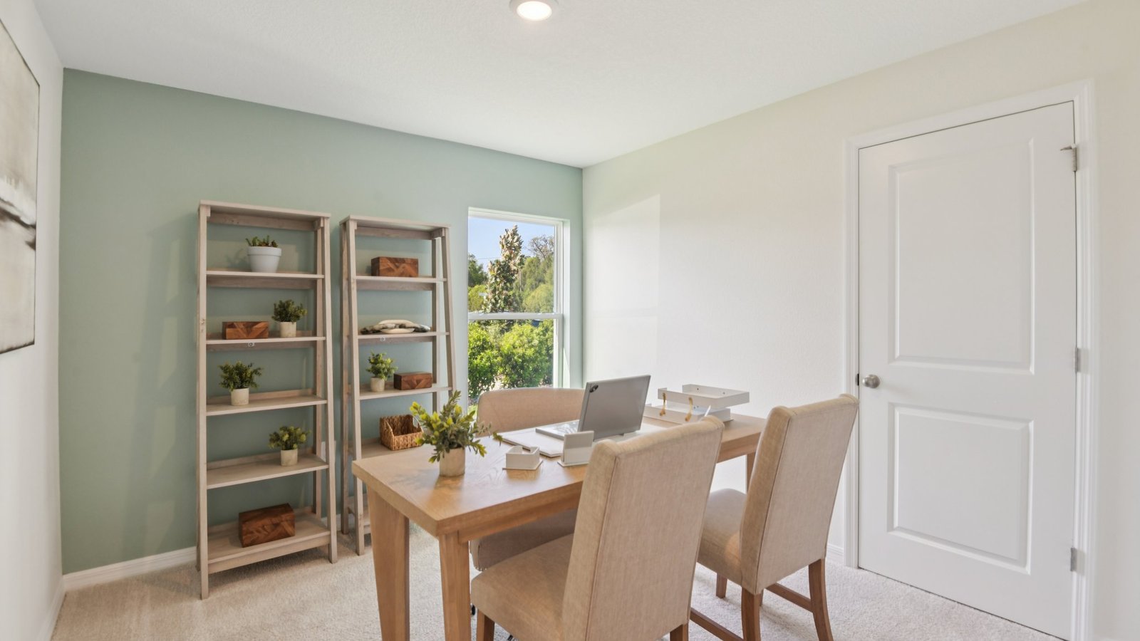 Functional home office with desk, chairs and space to work or play.