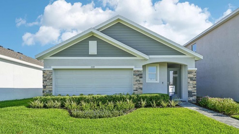 Allex II. Single story new home with siding, covered porch and 2 car garage.
