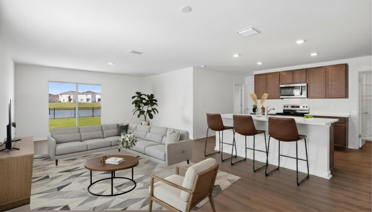Dining room adjacent to the kitchen with table, chairs and LVP flooring.