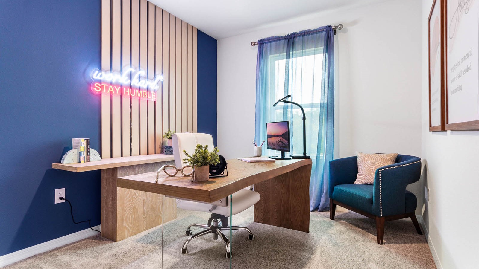 Functional home office with desk, chairs and space to work or play.