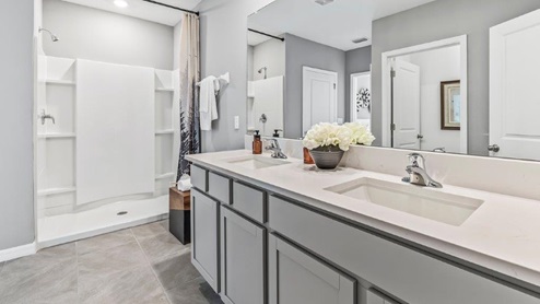 Modern ensuite bathroom designed layout offering spa-inspired comfort, updated fixtures, clean sightlines