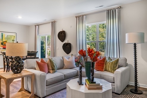 open concept living space with large windows