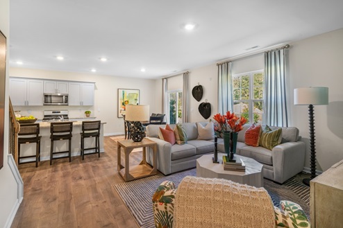 open concept living space with large windows