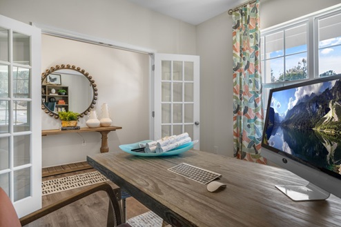 flex room with large windows, french doors