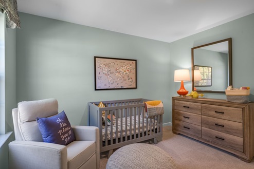 additional bedroom with window, carpeting, closet