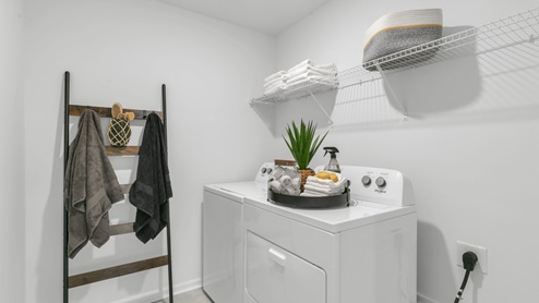 laundry room with wire shelving