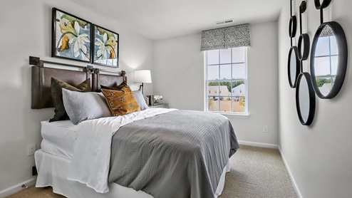Pearson model bedroom with carpet flooring