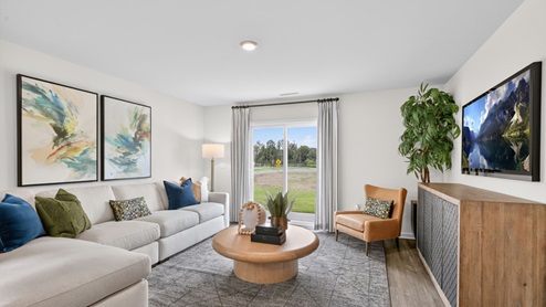 open concept living space with large windows
