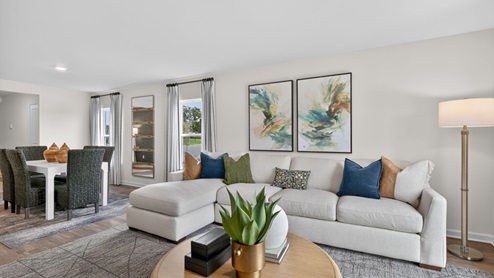 open concept living space with large windows