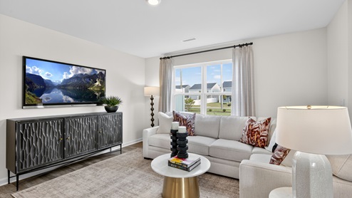 open concept living space with large windows