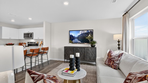 open concept living space with large windows