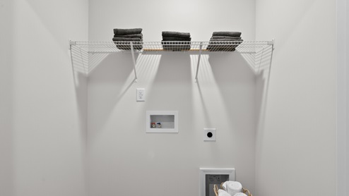 laundry room with wire shelving