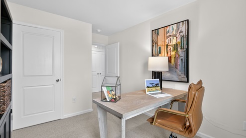 additional bedroom with window, carpeting, closet