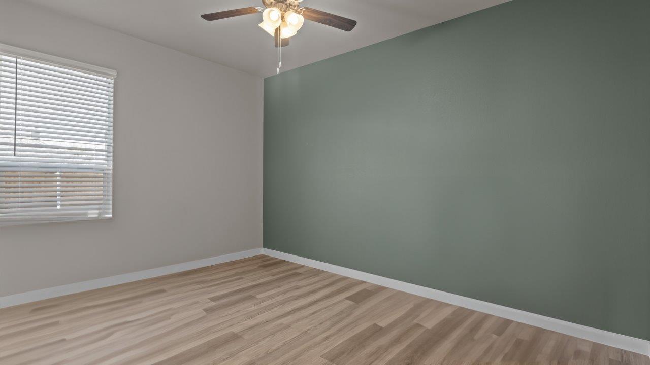 Guest bedroom 3 with side window to allow for natural lighting