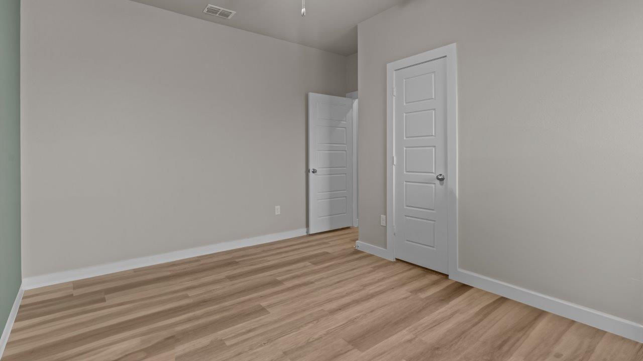 Guest bedroom 3 with side window to allow for natural lighting